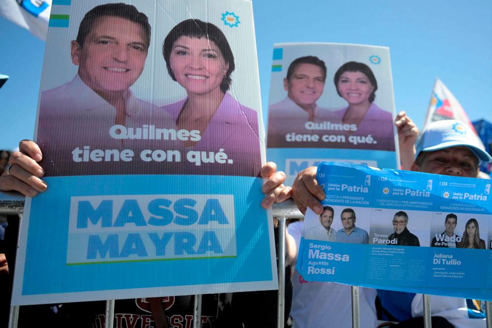 Supporters of Argentina’s Economy Minister and presidential candidate for the Union por la Patria party, Sergio Massa, attend the Buenos Aires province closing campaign celebrating Peronist Loyalty Day at the Julio Humberto Grondona stadium in Sarandi, Buenos Aires, on October 17, 2023. AFPPIX