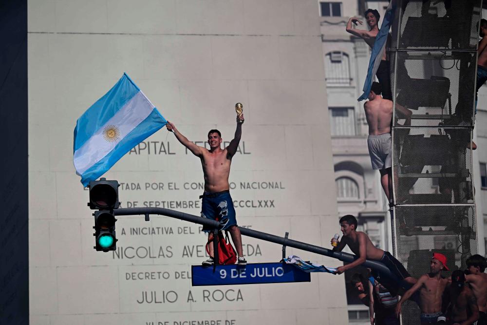 Fans of Argentina gather at the Obelisk to celebrate winning the Qatar 2022 World Cup against France in Buenos Aires, on December 18, 2022. AFPPIX