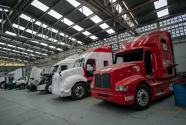 View of semi trailer trucks under armouring process at a plant in Ecatepec — AFP