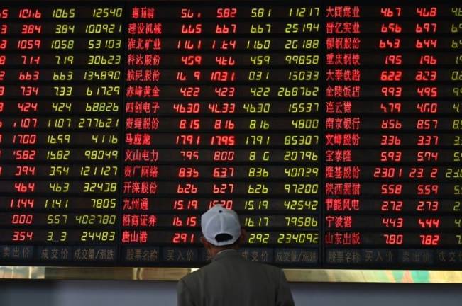 Asian shares gain as trade deal hopes flicker among Trump's mixed signals