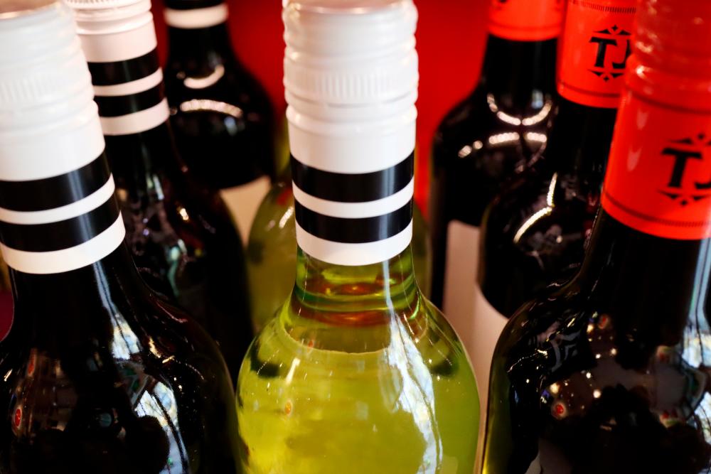 Bottles of Australian wine are seen at a store selling imported wine in Beijing, China, in November 2020. China has since imposed dumping tariffs on Australian wine and barley, and restricted the unloading of Australian coal at Chinese ports. – REUTERSPIX