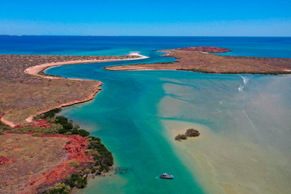 $!This handout aerial picture taken on September 9, 2019 and released by the DHSC Project and Flinders University, Maritime Archaeology Program, shows an archaeological research area in the Dampier Archipelago off the remote Western Australia coast. / AFP / FLINDERS UNIVERSITY /
