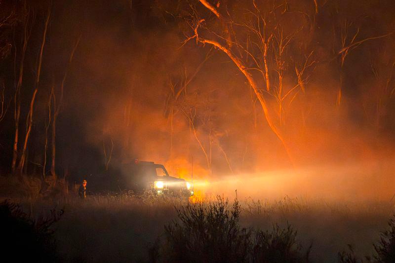 A fire truck arriving to battle bushfires in Little Desert National Park in the Australian state of Victoria - AFPpix