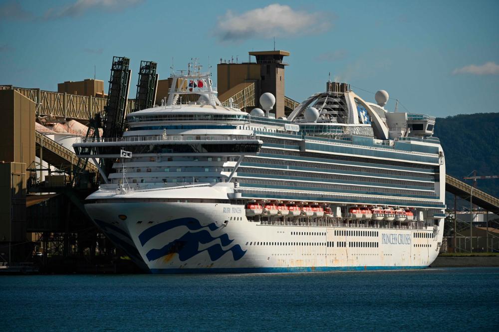 Cruise liner Ruby Princess sits in the harbour in Port Kembla, 80km south of Sydney after coming in to refuel and restock on April 6, 2020. - AFP