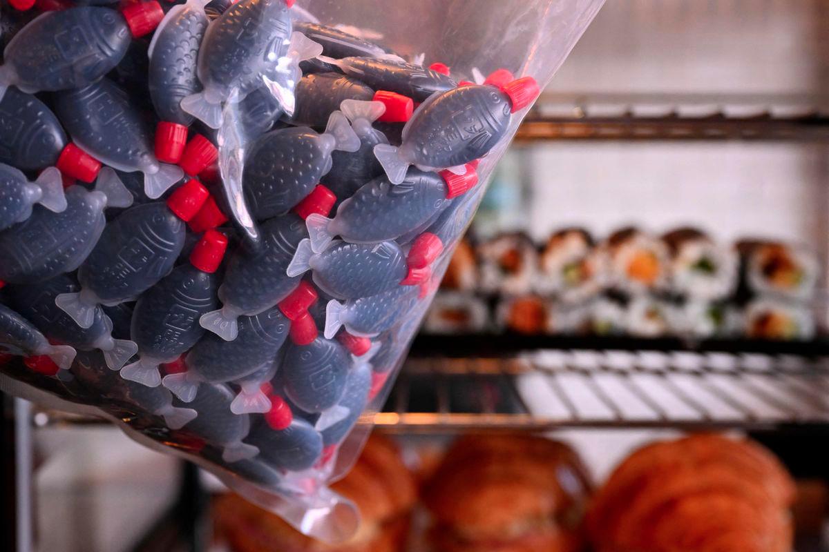 A photo taken on September 2, 2025 shows plastic fish-shaped soy sauce containers in a Melbourne cafe as South Australia bans the containers as part of a state crackdown on single-use plastic. - AFPPIX