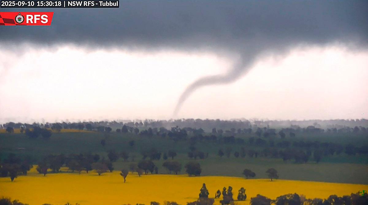 This screengrab from handout surveillance camera footage taken and released by New South Wales Rural Fire Service (NSW RFS) on September 10, 2025 shows a tornado over the countryside near Young in New South Wales.