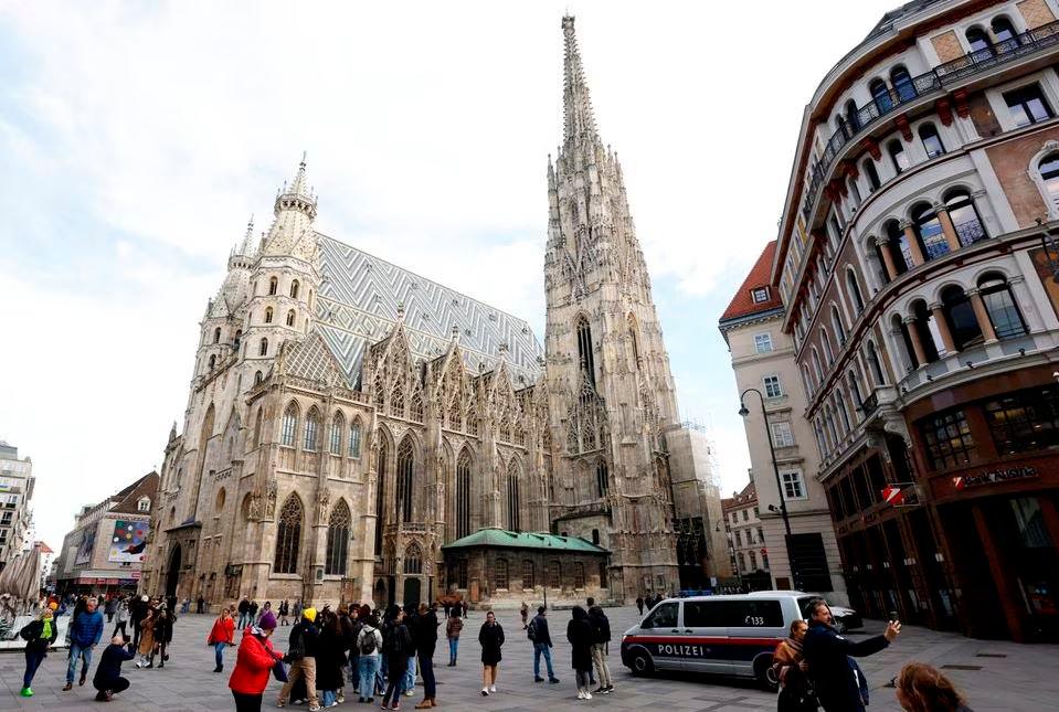 An Austrian police car passes St. Stephens cathedral in Vienna, Austria, March 15, 2023. REUTERSPIX