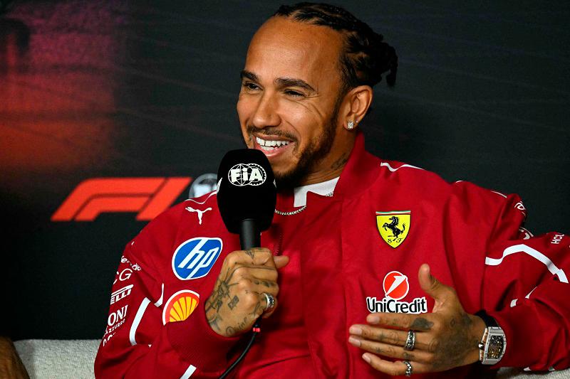 Ferrari’s British driver Lewis Hamilton attends a press conference at the Albert Park circuit in Melbourne on March 13, 2025, ahead of the Formula One Australian Grand Prix. - Saeed KHAN / AFP