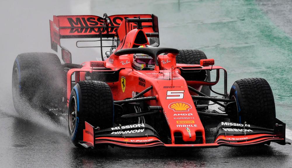 German F1 driver Sebastian Vettel powers his Ferrari at the Interlagos racetrack in Sao Paulo, Brazil, on Nov 15, 2019, during the first free practice for the Brazilian Formula One GP. . — AFP