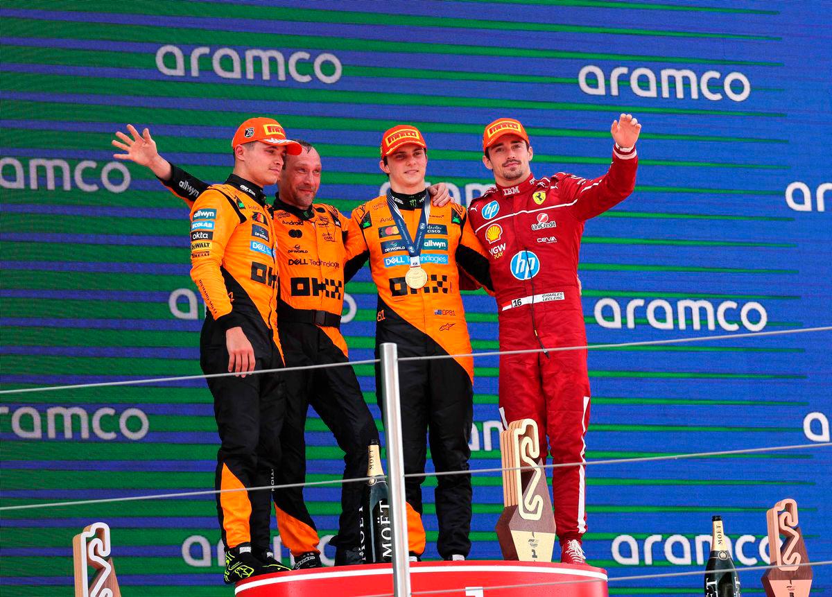 McLaren’s British driver Lando Norris (L), McLaren’s Australian driver Oscar Piastri (2R) and Ferrari’s Monegasque driver Charles Leclerc (R) celebrate on the podium after the Formula One Spanish Grand Prix at the Circuit de Catalunya in Montmelo, on the outskirts of Barcelona, on June 1, 2025. AFPpix