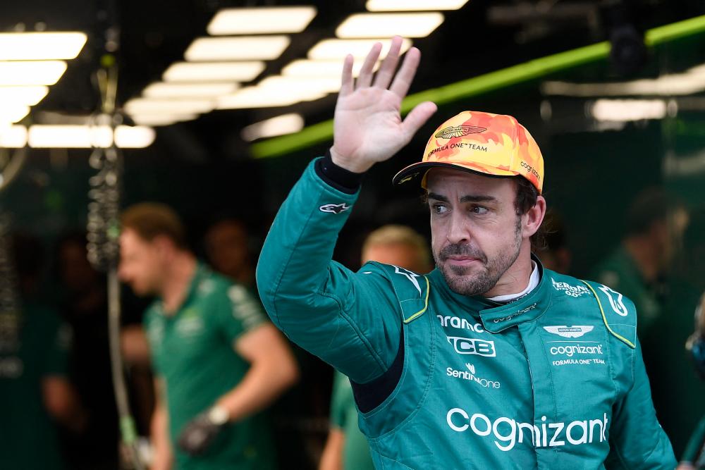 Aston Martin’s Spanish driver Fernando Alonso waves during the second free practice session of the Spanish Formula One Grand Prix at the Circuit de Catalunya on June 2, 2023 in Montmelo, on the outskirts of Barcelona/AFPPix