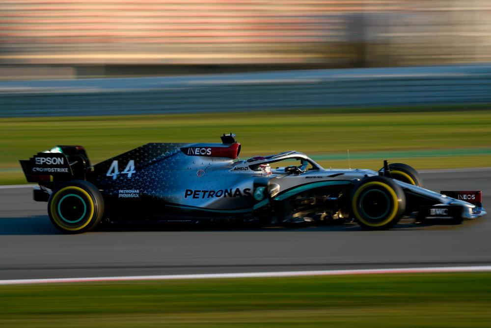 Mercedes' British driver Lewis Hamilton drives during the tests for the new Formula One Grand Prix season at the Circuit de Catalunya in Montmelo in the outskirts of Barcelona on February 21. — AFP