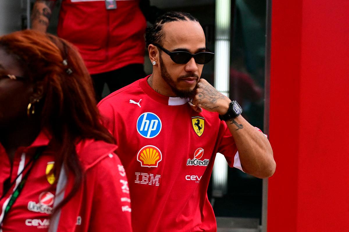 Ferrari’s British driver Lewis Hamilton in the paddock ahead of the third practice session for the Formula One British Grand Prix at the Silverstone motor racing circuit in Silverstone, central England, on July 5, 2025 - AFP