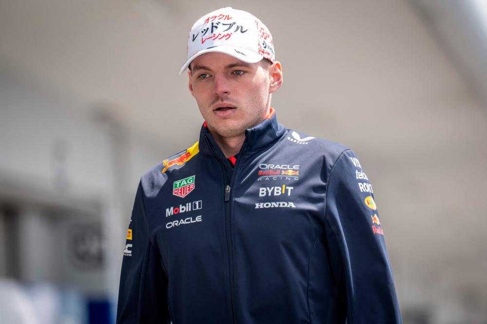 Red Bull Racing’s driver Max Verstappen walks through the paddock ahead of the Formula One Japanese Grand Prix at the Suzuka circuit in Suzuka, Mie prefecture on April 4, 2024/AFPpix