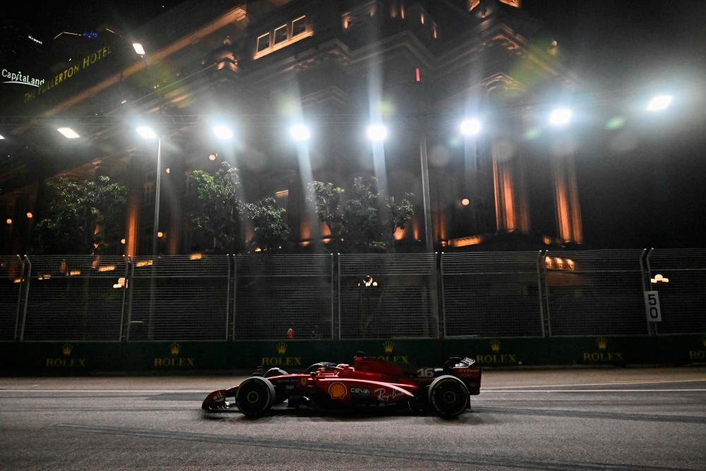 Ferrari's Monegasque driver Charles Leclerc drives during the second practice session ahead of the Singapore Formula One Grand Prix night race at the Marina Bay Street Circuit in Singapore on September 15, 2023/AFPPix