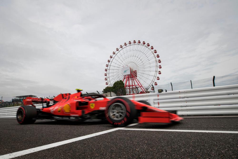 Ferrari's Monegasque driver Charles Leclerc drives in the first practice session for the Formula One Japanese Grand Prix in Suzuka on Oct 11, 2019. — AFP