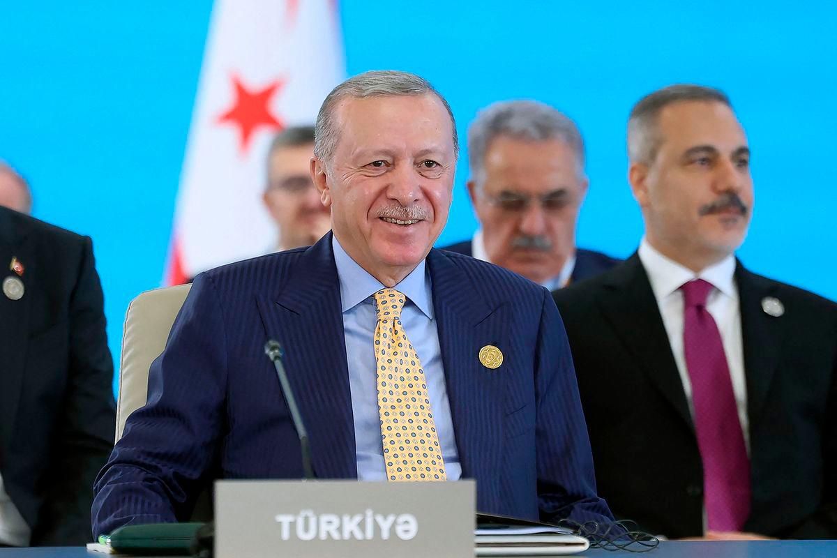 Turkey’s President Recep Tayyip Erdogan attending a session of the 12th Summit of the Organization of Turkic State (OTS) in Gabala, Azerbaijan. (Photo by Mustafa Kamaci / TURKISH PRESIDENCY PRESS OFFICE / AFP)