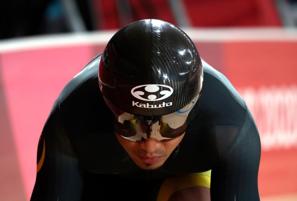 Aug 4 National track cyclist Datuk Azizulhasni Awang while competing in the qualifying round of the sprint event at Izu Veledrome. — Bernama