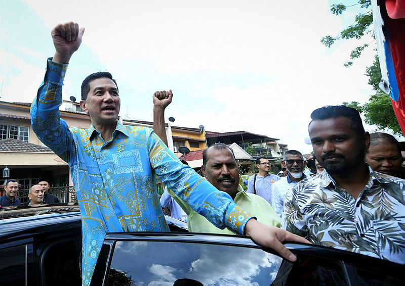 Datuk Seri Azmin Ali is greeted by supporters during the Gombak Setia constituency’s Aidilfitri do, on June 16, 2019. — Bernama