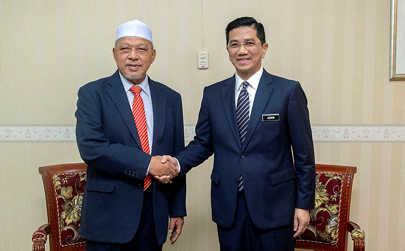 Economic Affairs Minister Datuk Seri Mohamed Azmin Ali (R) and Kelantan Mentri Besar Datuk Ahmad Yakob pose for a photo at the Kota Darul Naim building, on July 9, 2019.