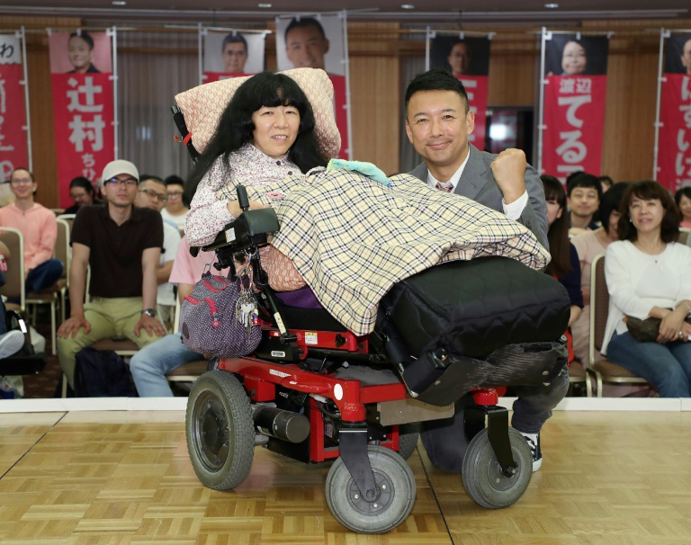 Newly elected lawmaker Eiko Kimura, who is paralysed from the neck down, has called for a system to ensure necessary care for the disabled. — AFP