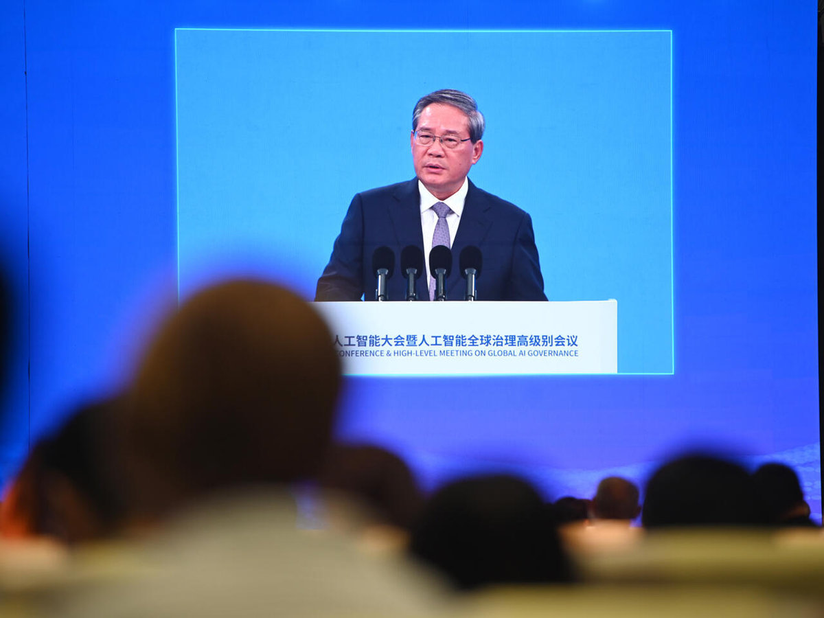 Chinese Premier Li Qiang is seen on a screen at the opening ceremony of the World Artificial Intelligence Conference in Shanghai on July 26, 2025. - AFP