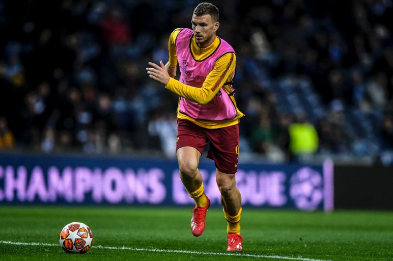 Edin Dzeko (pictured March 6, 2019) was presented with a shirt bearing the number ‘100’ to mark his becoming the first Bosnian player to reach 100 international caps. — AFP