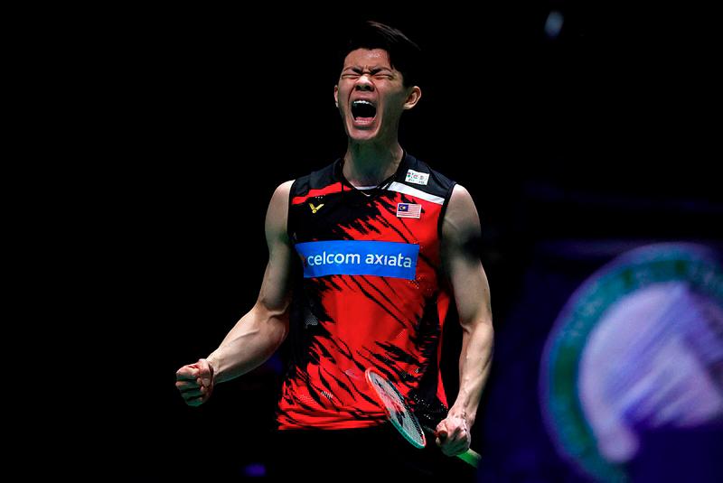 $!Malaysia’s Lee Zii Jia reacts to winning a point against Denmark’s Viktor Axelsen during the men’s singles final on the last day of the All England Open Badminton Championship at the Utilita Arena in Birmingham, central England, on March 21, 2021. / AFP