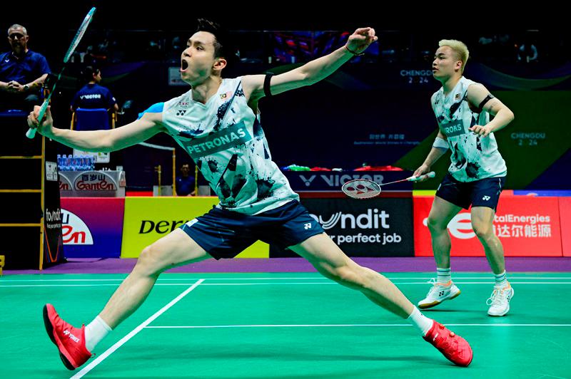 Malaysia’s Aaron Chia (R) and Soh Wooi Yik play a point during their men’s doubles group stage match against Denmark’s Kim Astrup and Anders Skaarup Rasmussen at the Thomas and Uber Cup badminton tournament in Chengdu, in southwest China’s Sichuan province on April 30, 2024 // AFPPIX
