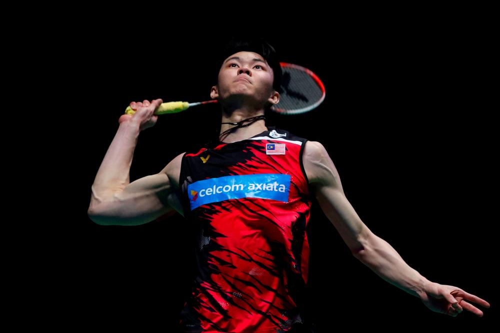 Malaysia’s Lee Zii Jia returns against Denmark’s Viktor Axelsen during the men’s singles final on the last day of the All England Open Badminton Championship at the Utilita Arena in Birmingham, central England, on March 21, 2021. AFPPIX