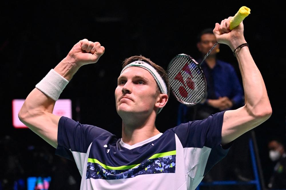 Denmark’s Viktor Axelsen celebrates his victory against China’s Zhao Junpeng during the men’s singles final at the Indonesia Open badminton tournament in Jakarta on June 19, 2022. AFPPIX