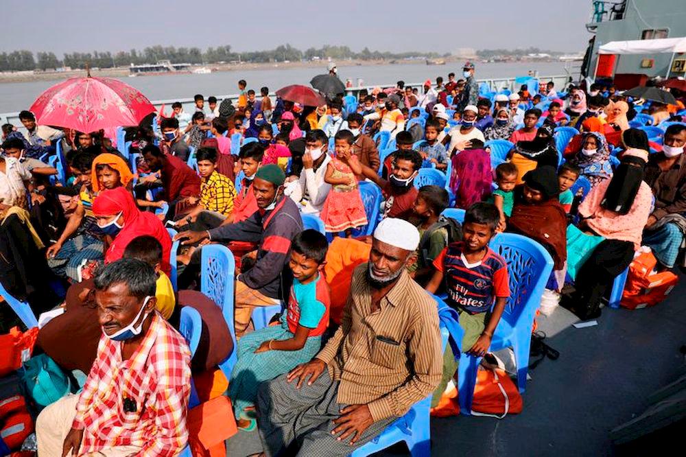 Rohingya refugees are seen aboard a ship as they are moved to Bhasan Char Island in Chattogram, Bangladesh, Dec. 4, 2020. — Reuters