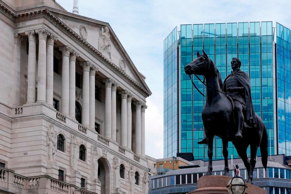 Filepix: A view of the Bank of England in London. The central bank will now buy up to £5 billion a day of British government bonds of at least 20 years, until Oct 14/Reuterspix