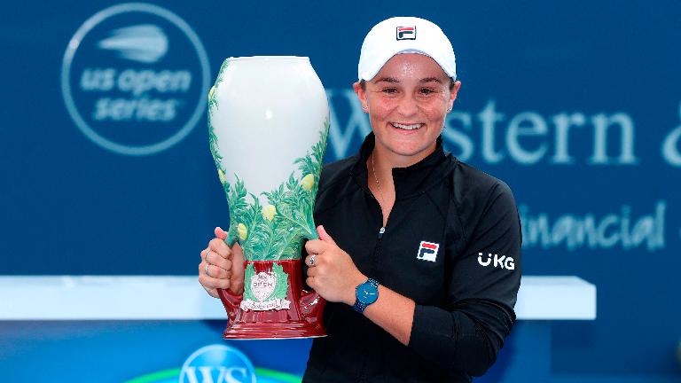 Ashleigh Barty of Australia holds the championship trophy after defeating Jil Teichmann (not pictured) of Switzerland at Lindner Family Tennis Center – AFPPIX