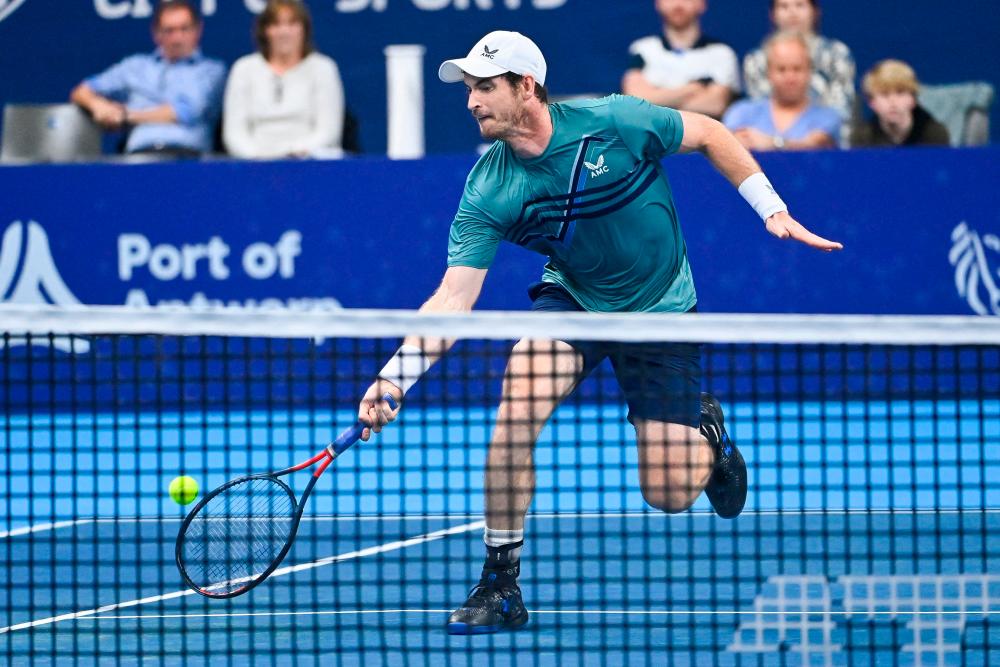 Britain’s Andy Murray returns the ball during a match gainst US’ Frances Tiafoe in the first round of the European Open Tennis ATP tournament, in Antwerp on October 19, 2021. AFPpix