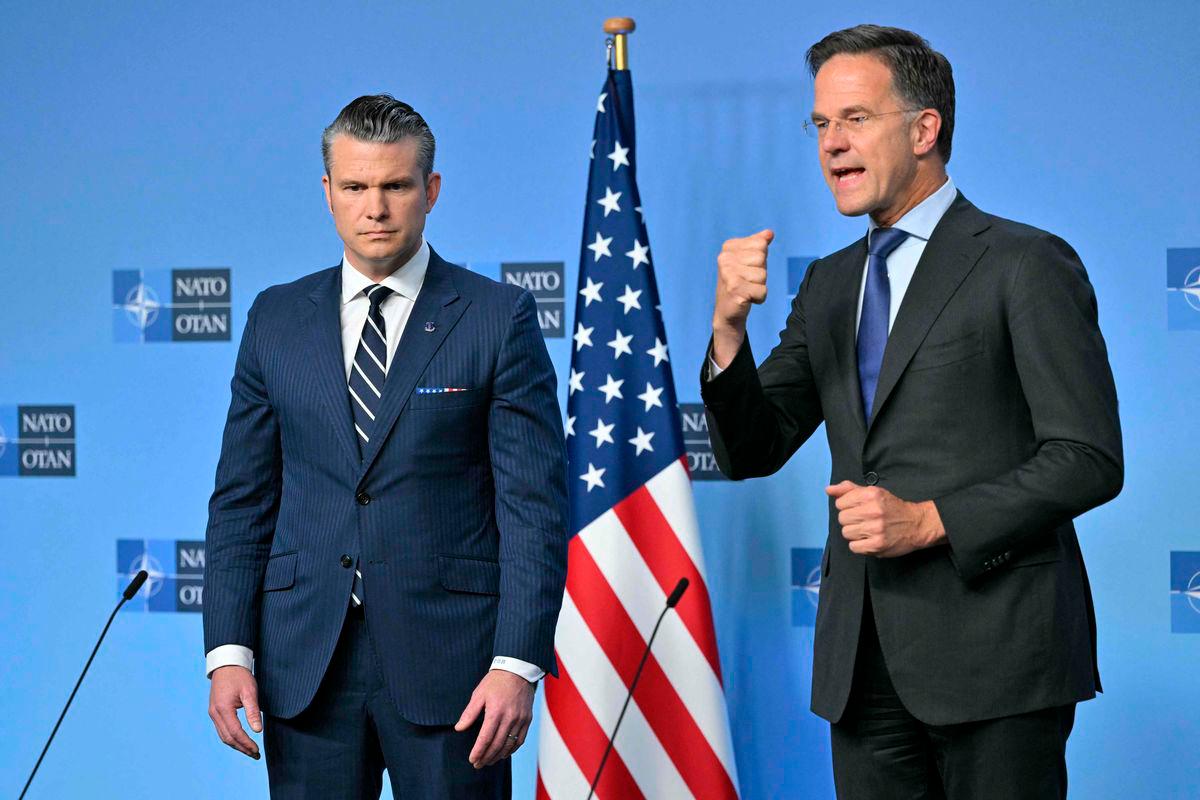 NATO Secretary General Mark Rutte (R) and US Secretary of Defence Pete Hegseth deliver remarks before a Defence Ministers meeting at the NATO headquarters, in Brussels, on June 5, 2025. AFP
