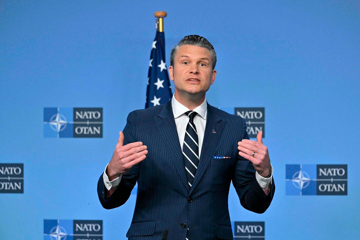 US Secretary of Defence Pete Hegseth speaks as he delivers remarks with NATO Secretary General before a Defence Ministers meeting at the NATO headquarters, in Brussels, on June 5, 2025. - NICOLAS TUCAT / AFP