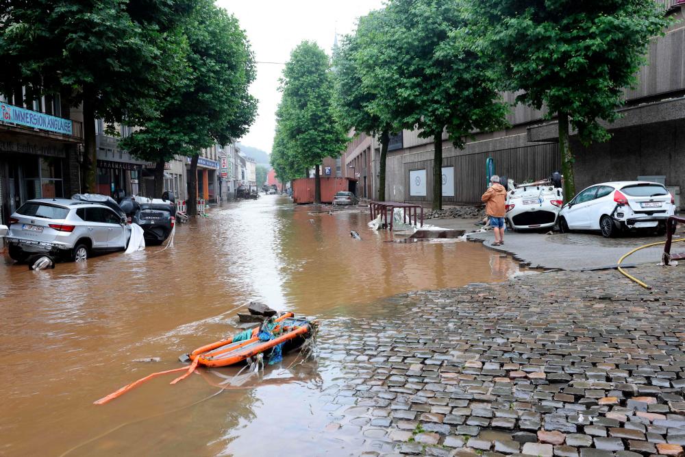 A picture taken on July 15, 2021 shows a flooded street in the Belgian city of Verviers, after heavy rains and floods lashed western Europe, killing at least two people in Belgium. -AFP