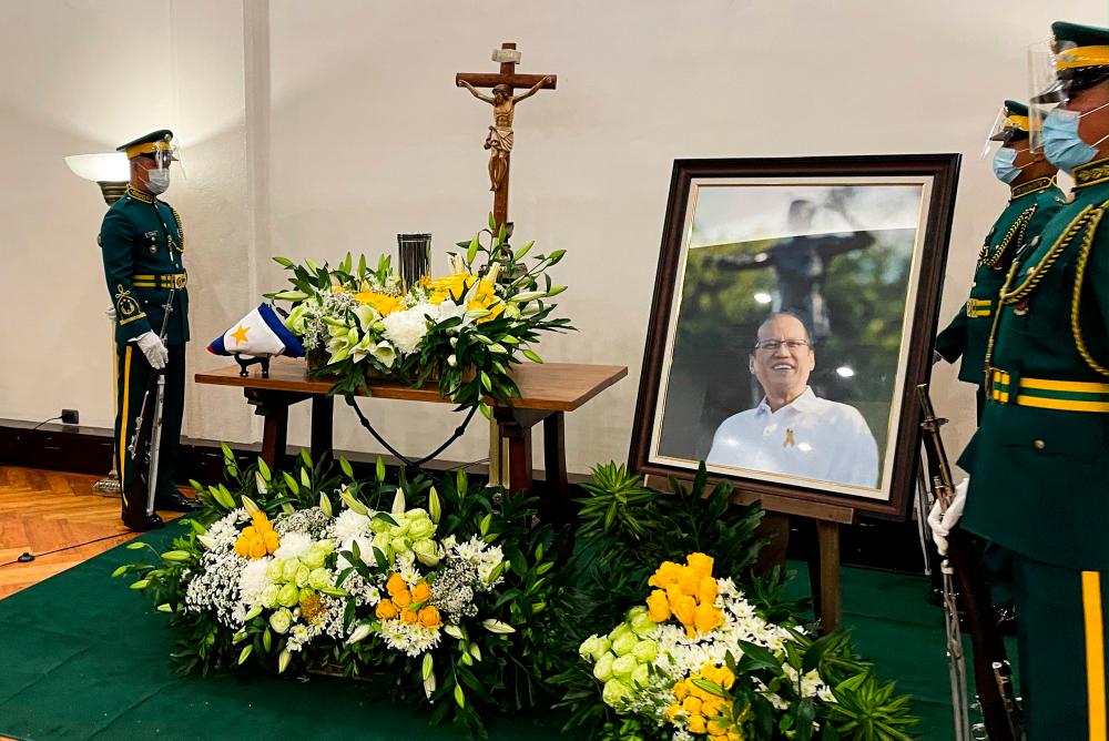 Military guards stand next to the urn of former Philippine President Benigno Aquino at the Heritage Park, in Taguig City, Metro Manila, Philippines, June 24, 2021. — Reuters