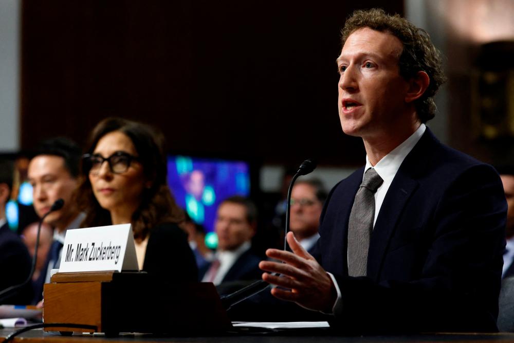 Zuckerberg testifying before the Senate Judiciary Committee at the Dirksen Senate Office Building in Washington DC on Wednesday. The CEO of Meta testified along with X CEO Linda Yaccarino, Snap CEO Evan Spiegel, TikTok CEO Shou Zi Chew and Discord CEO Jason Citron. – AFPpic