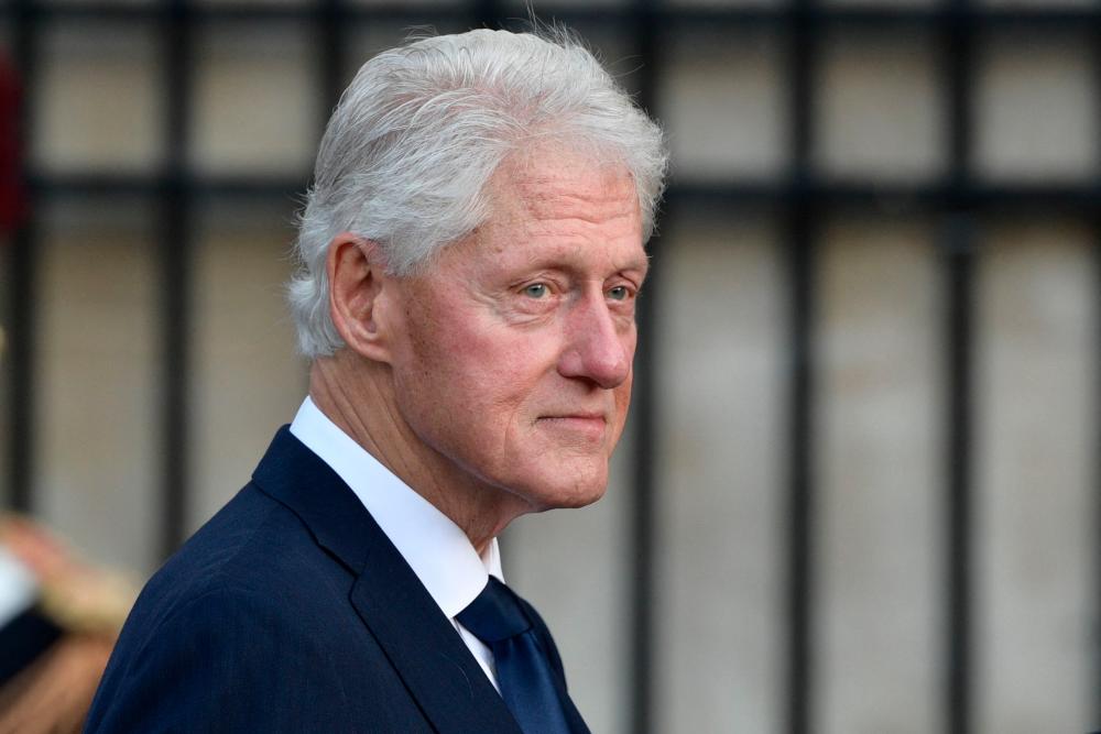 (FILES) In this file photo taken on September 30, 2019, former US President Bill Clinton arrives to attend a church service for former French President Jacques Chirac at the Saint-Sulpice church in Paris. AFPpix
