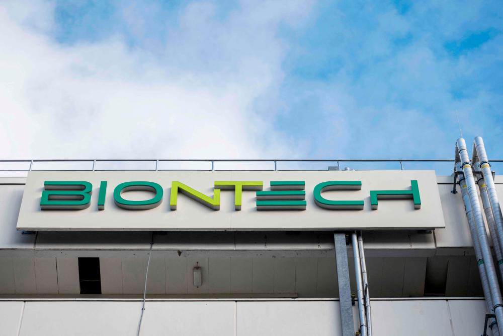 The BioNTech logo is seen at the company’s manufacturing site for the production of the Covid-19 vaccine is seen in Marburg, central Germany. – AFPPIX