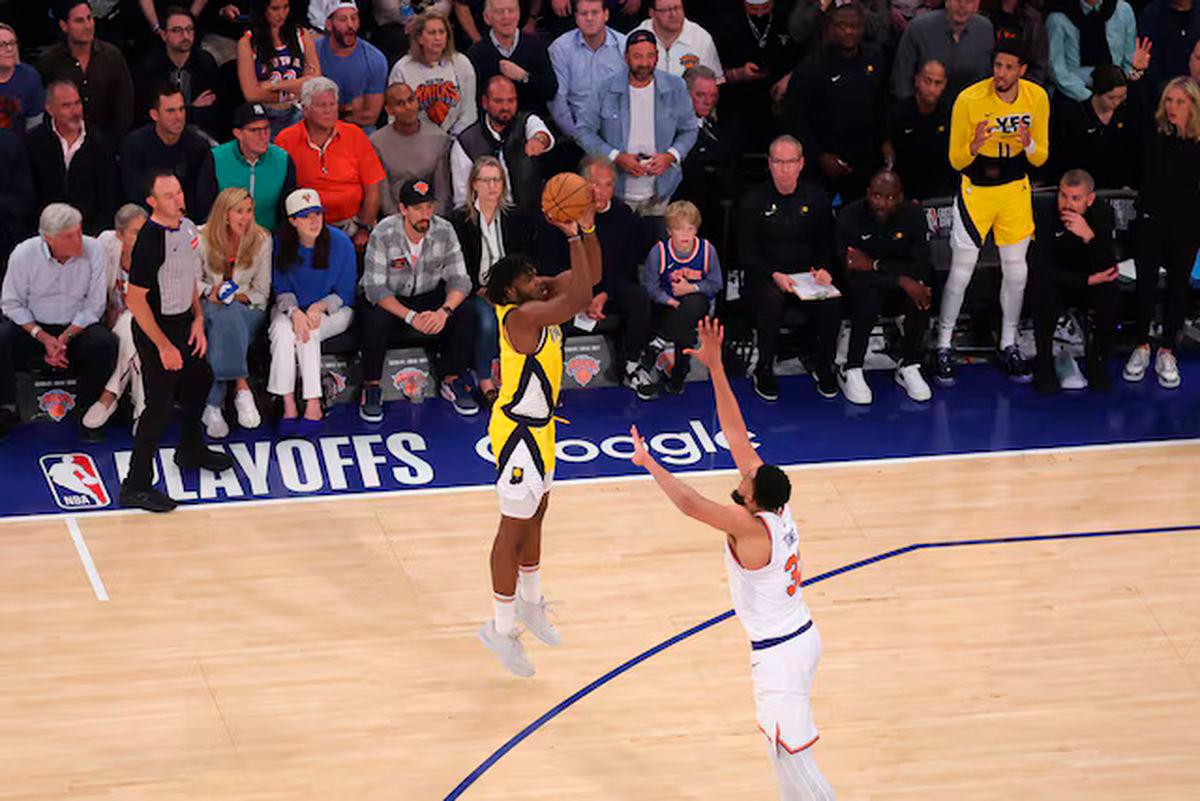 May 29, 2025; New York, New York, USA; Indiana Pacers forward Jarace Walker (5) shoots against New York Knicks center Karl-Anthony Towns (32) in the fourth quarter during game five of the eastern conference finals for the 2025 NBA Playoffs at Madison Square Garden. Mandatory Credit: Brad Penner-Imagn Images