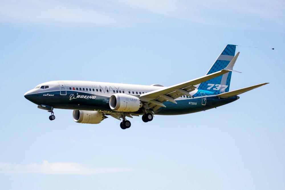 A Boeing 737 MAX jet comes in for a landing after a Federal Aviation Administration test flight at Boeing Field in Seattle, Washington. – AFPPIX