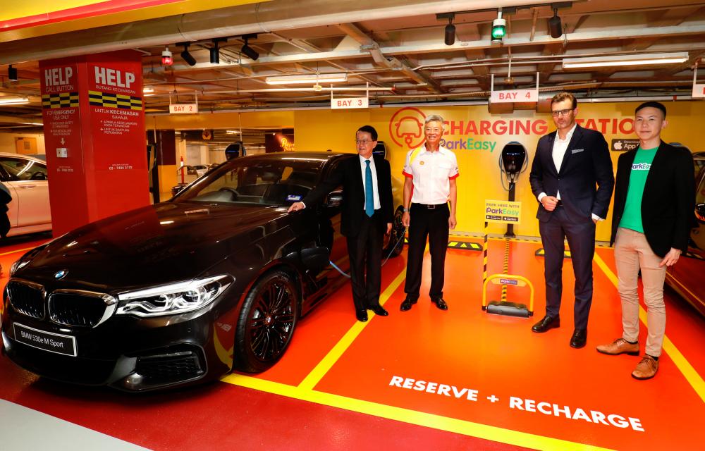 $!BMW, partners introduce ‘Reserve + Shell’ charging bays