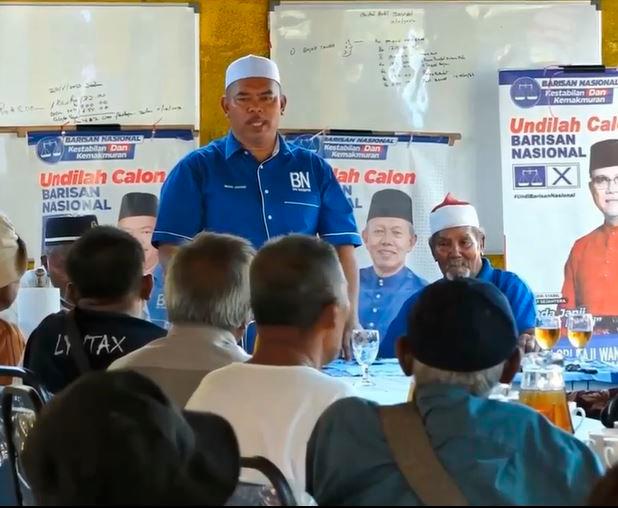 Barisan Nasional (BN) candidate Datuk Seri Mohd Johari Hussain during his campaign trail - BERNAMA TV