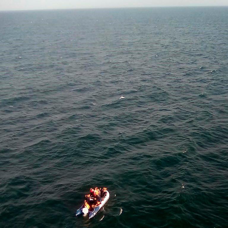A boat in which some 11 migrants were attempting to cross the English Channel, in waters off the coastal town of Calais, northern France. — AFP