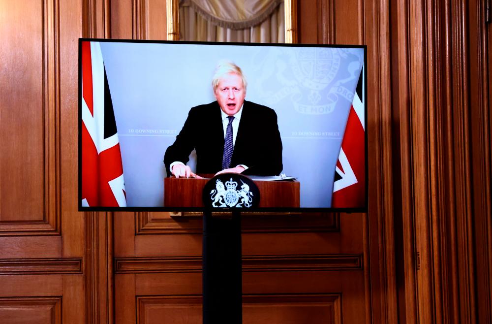 Britain's Prime Minister Boris Johnson attends a virtual news conference on the ongoing situation with the coronavirus disease (Covid-19), at Downing Street, London, Britain November 23, 2020. — Reuters