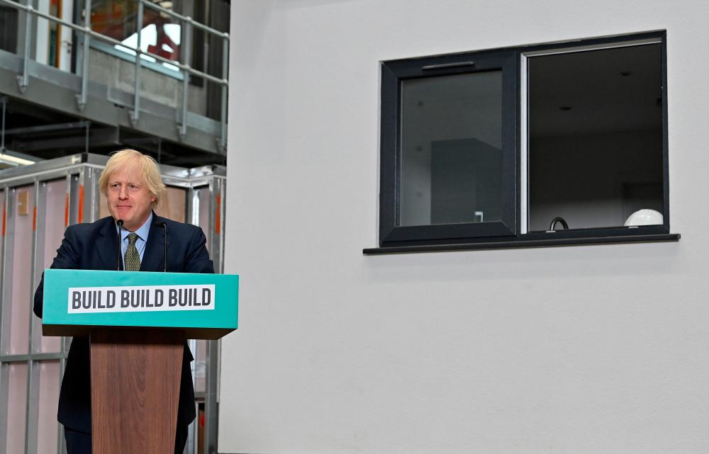 Johnson delivering a speech during his visit to Dudley College of Technology in Dudley. – REUTERSPIX
