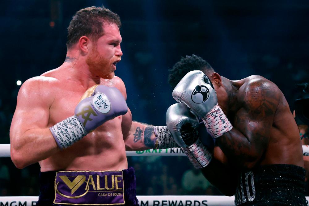 Canelo Alvarez dominates Jermell Charlo, retains undisputed super  middleweight titles